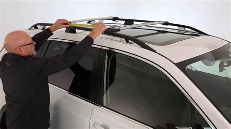 how to remove yakima rack from roof rails